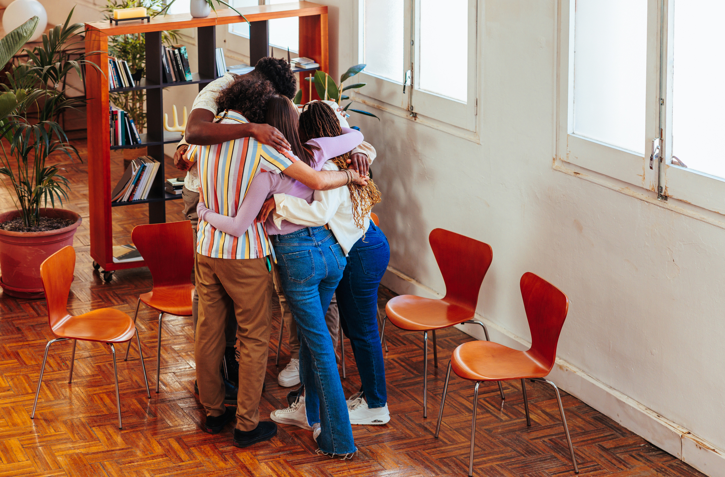 Therapy members having group hug